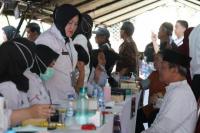 Kemenimipas Gelar Pengobatan Gratis dan Bansos Warga Cipinang Besar Utara